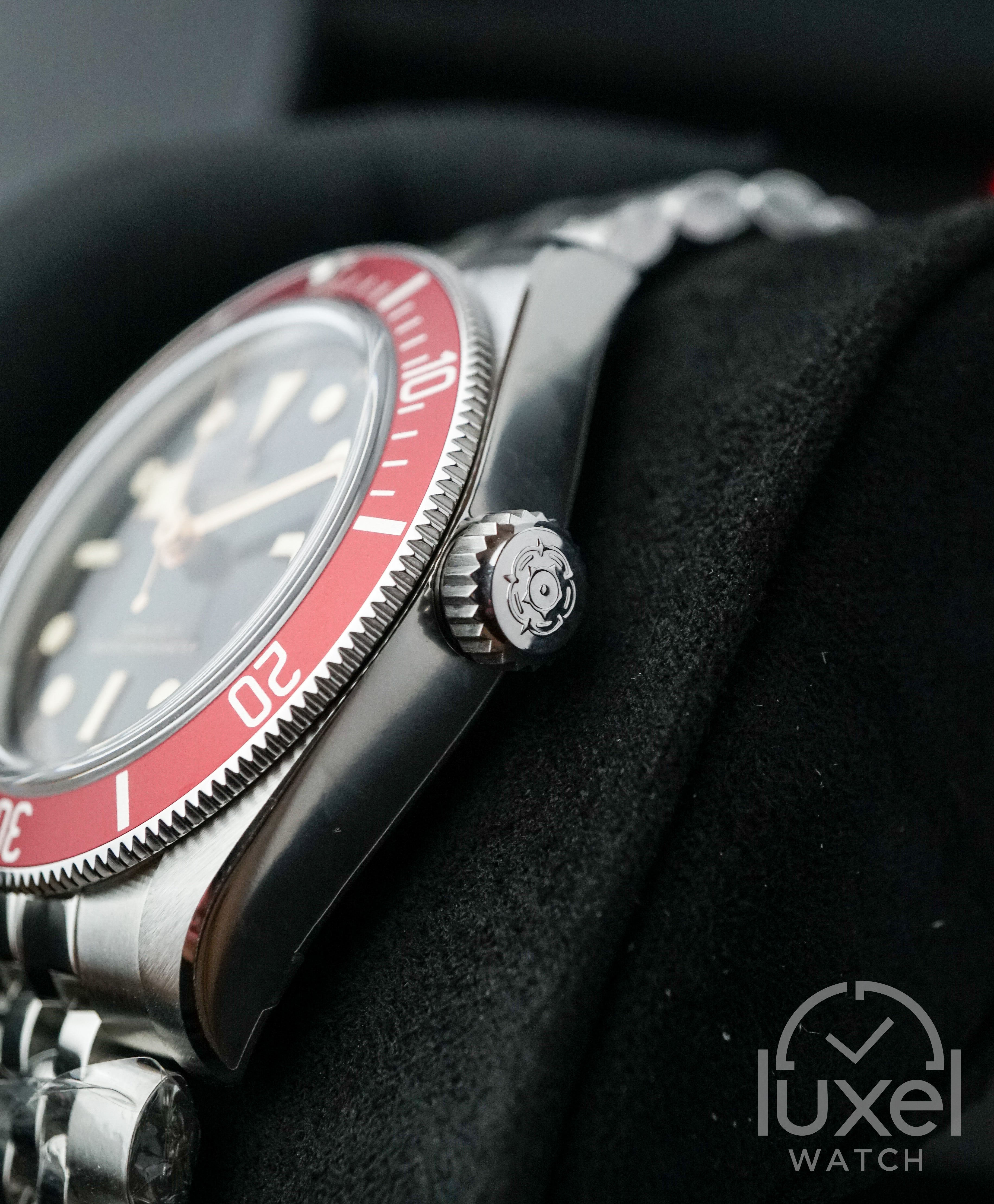 Black Bay 41  Black Domed Dial With Red Bezel Jubilee Bracelet M7941A1A0RU-0003